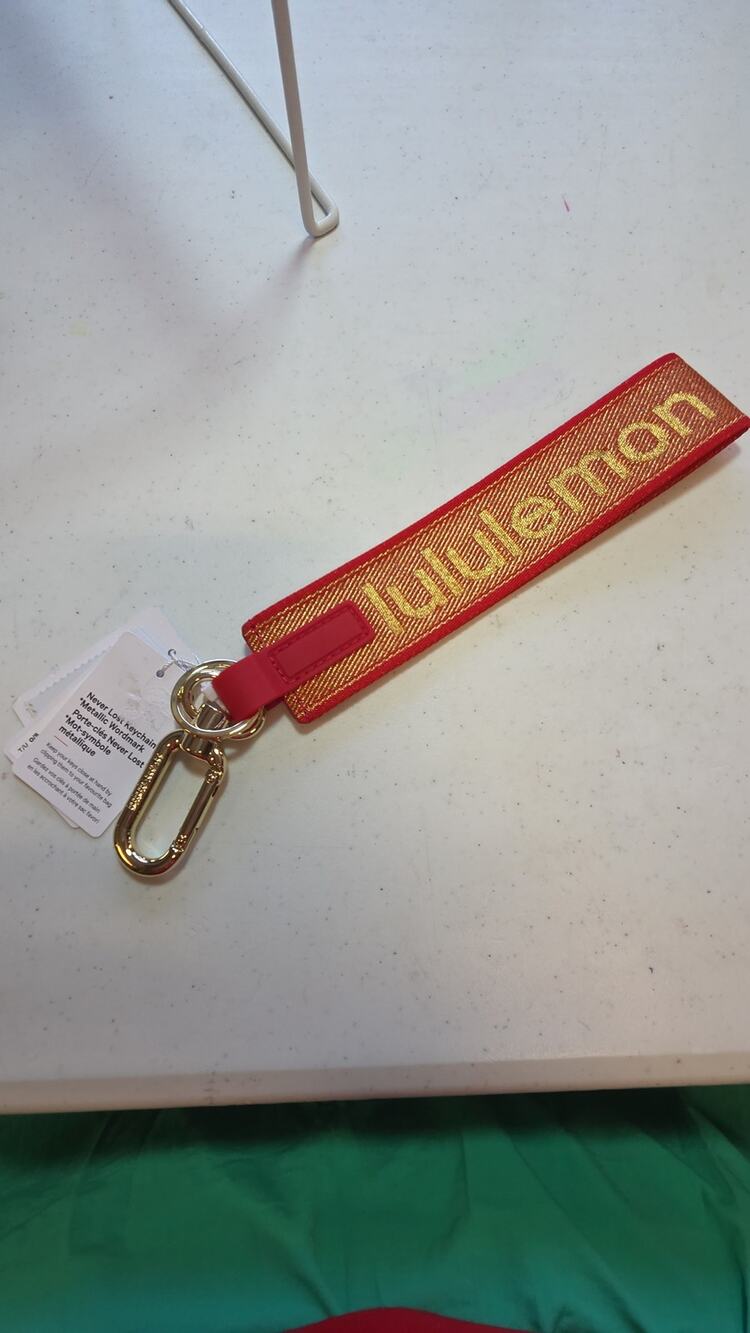 Lululemon Red Metallic Gold Logo Never Lost Keychain NWT